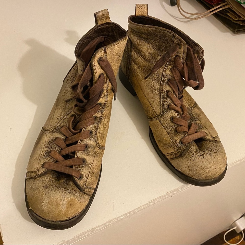 Distressed combat boots